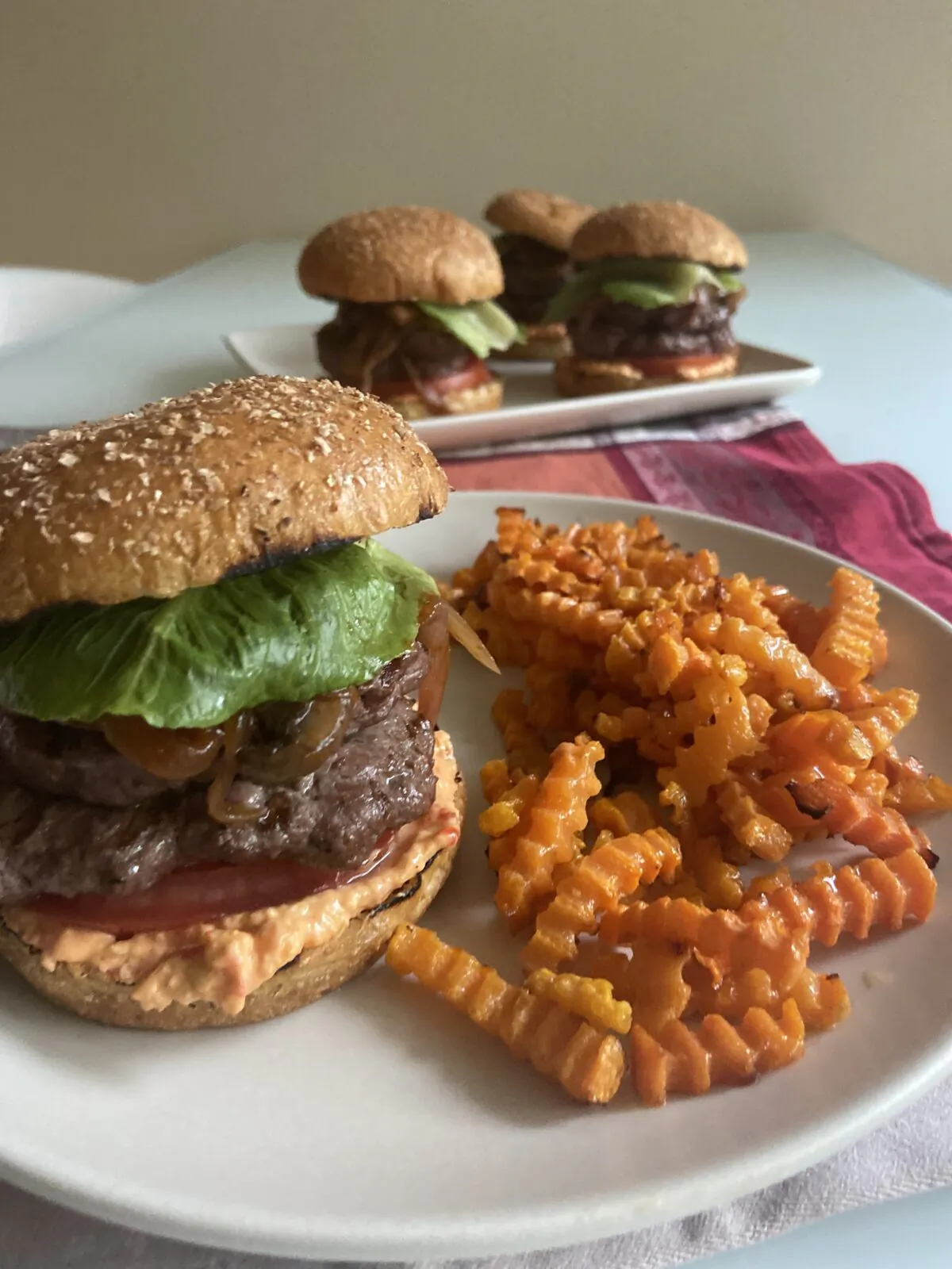 Ground venison makes a deliciously rich, yet lean, out-of-the-ordinary burger. (JeanMarie Brownson/TNS)