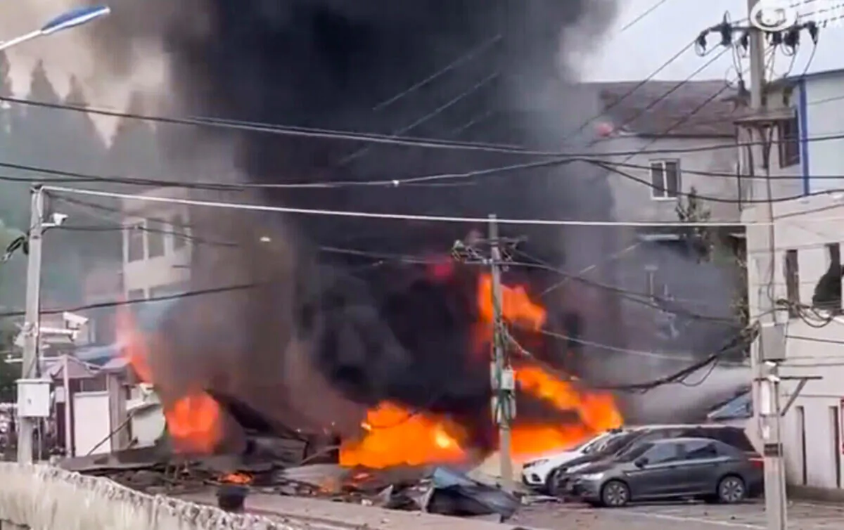 A screenshot from Weibo of a plane that crashed near an airport in in Xiangyang city, Hubei Province, China, on June 9, 2022. (Screenshot via The Epoch Times)