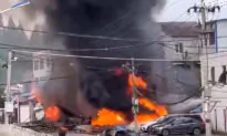 Chinese Military Jet Crashes Into Houses, Killing at Least 1