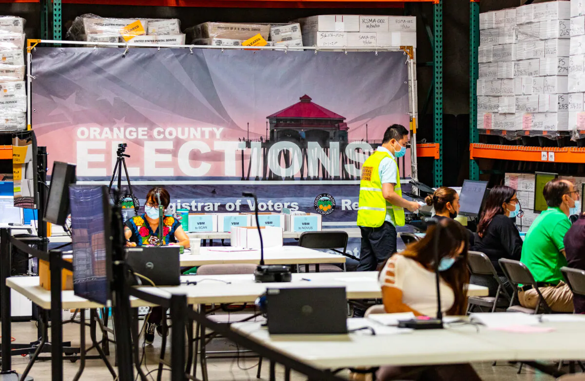 Voting ballots are processed at the Orange County Registrar of Voters office in Santa Ana, Calif., on June 9, 2022. (John Fredricks/The Epoch Times)