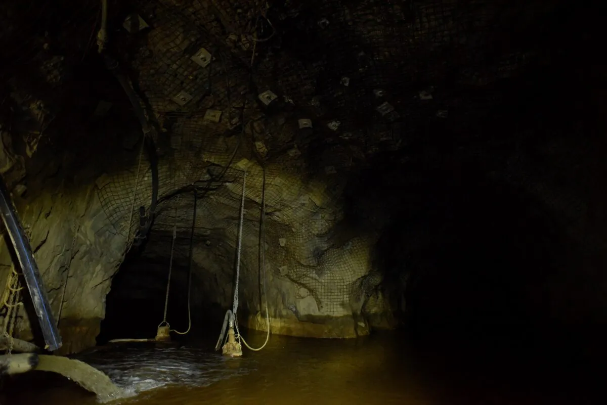 A view shows one of the galleries during a rescue operation inside Perkoa mine where water is still being pumped out in Perkoa, Burkina Faso, on May 13, 2022, four weeks after a flood trapped eight miners inside the galleries. (Anne Mimault/Reuters)