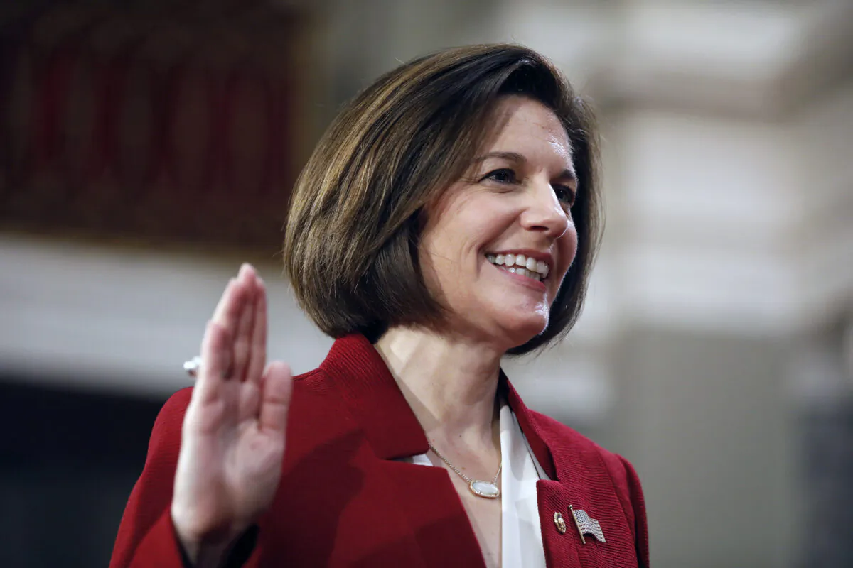 WASHINGTON, DC - JANUARY 3: U.S. Sen. Catherine Cortez Masto (D-NV) participates in a reenacted swearing-in with U.S. Vice President Joe Biden in the Old Senate Chamber at the U.S. Capitol January 3, 2017 in Washington, DC. Earlier in the day Biden swore in the newly elected and returning members on the Senate floor. (Photo by Aaron P. Bernstein/Getty Images)