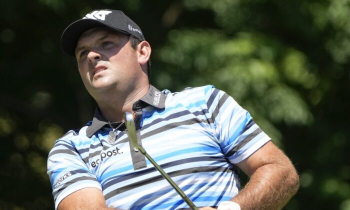 Patrick Reed plays his shot from the eighth tee during the second round of the Charles Schwab Challenge golf tournament, in Fort Worth, Texas, on May 27, 2022. (Jim Cowsert-USA TODAY Sports via Field Level media)