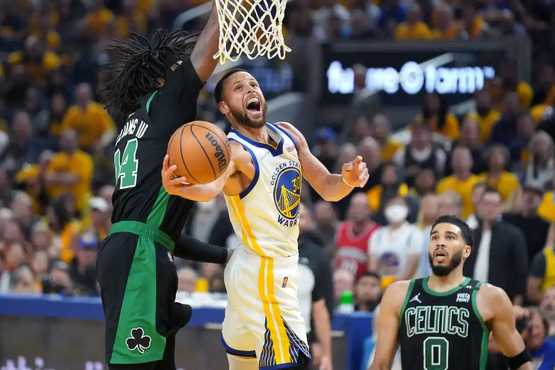 Golden State Warriors guard Stephen Curry (30) goes to the basket while defended by Boston Celtics center Robert Williams III (44) during the first half in game five of the 2022 NBA Finals at Chase Center in San Francisco on Jun 13, 2022. (Kyle Terada-USA TODAY Sports via Field Level Media)