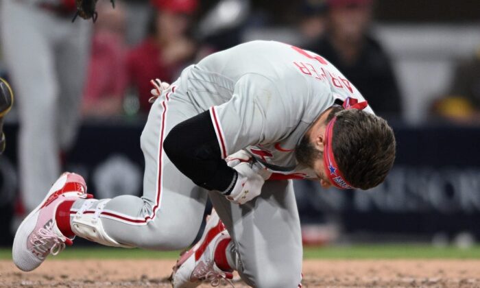 Philadelphia Phillies designated hitter Bryce Harper (3) reacts after being hit by a pitch during the fourth inning against the San Diego Padres at Petco Park in San Diego, Calif., on June 25, 2022. (Orlando Ramirez/USA TODAY Sports via Field Level Media)