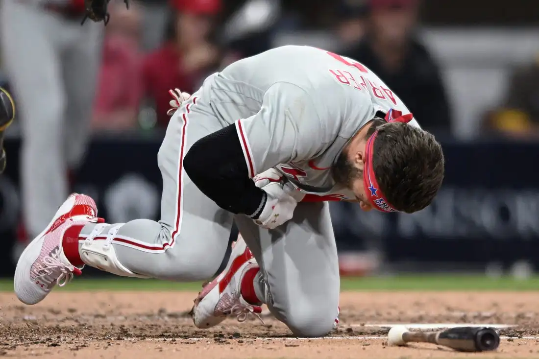 Philadelphia Phillies designated hitter Bryce Harper (3) reacts after being hit by a pitch during the fourth inning against the San Diego Padres at Petco Park in San Diego, Calif., on June 25, 2022. (Orlando Ramirez/USA TODAY Sports via Field Level Media)
