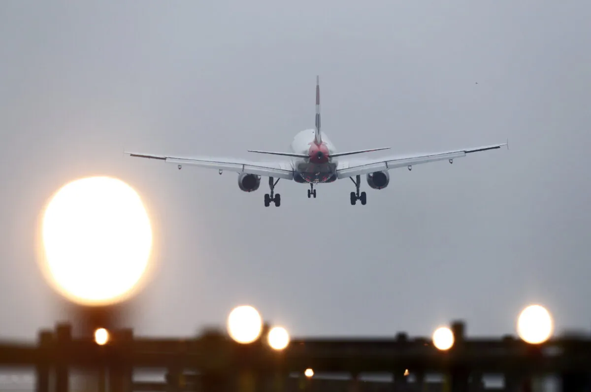 A plane landing in a file photo. (Gareth Fuller/PA Media)