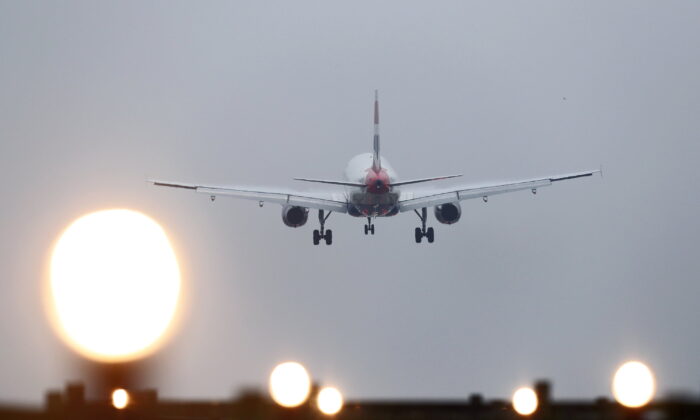 A plane landing at Gatwick Airport near London on Dec. 19, 2016. (Gareth Fuller/PA Media)