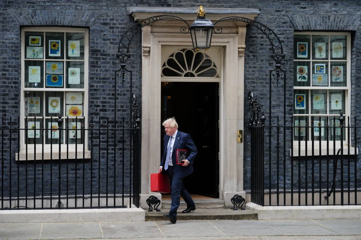 Undated photo showing Prime Minister Boris Johnson departs 10 Downing Street in London. (Dominic Lipinski/PA Media)