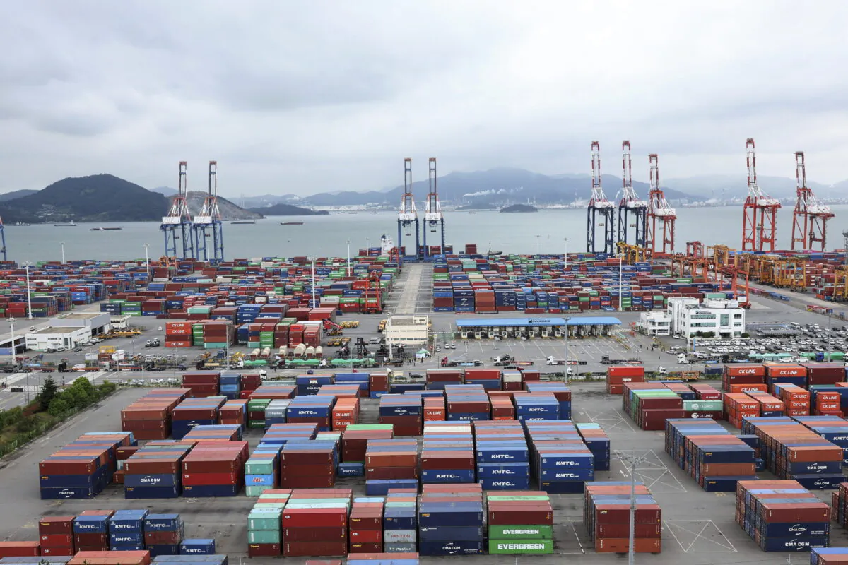 Stacked containers line a shipping port in Gwangyang, South Korea, on June 14, 2022. (Kim Dong-ju/AP)