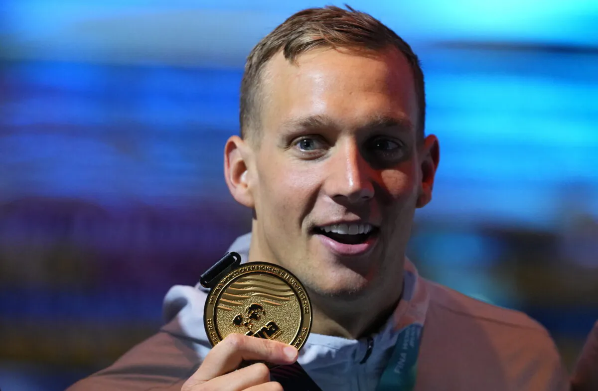 Caeleb Dressel of the United States poses with his medal after winning the Men 50m Butterfly final at the 19th FINA World Championships in Budapest, Hungary, on June 19, 2022. (Petr David Josek/AP Photo)