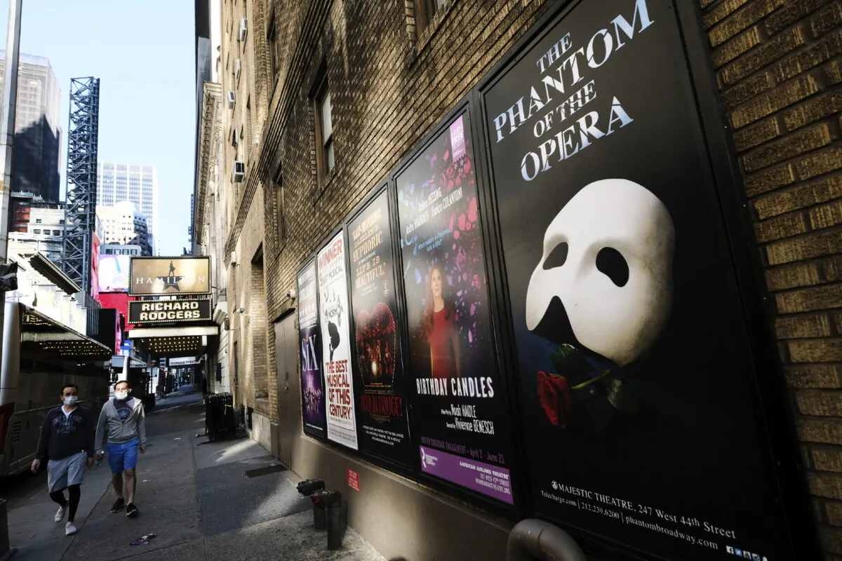 Broadway posters appear outside the Richard Rodgers Theatre during COVID-19 lockdown in New York on May 13, 2020. (Evan Agostini/Invision/AP)