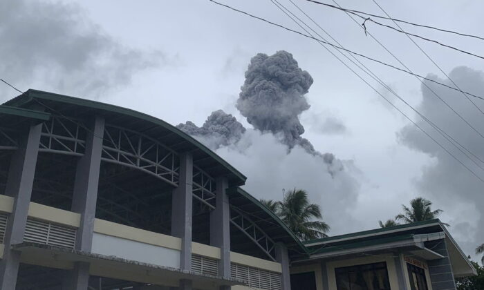 Ash and steam are spewed from Mount Bulusan, as seen from Casiguran, Sorsogon province in Philippines, on June 5, 2022. (Karlyn Dupan Hamor/AP Photo)