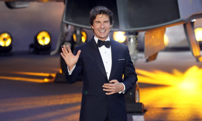 Tom Cruise poses for the media during the 'Top Gun Maverick' UK premiere at a central London cinema on May 19, 2022. (Alberto Pezzali/AP Photo)