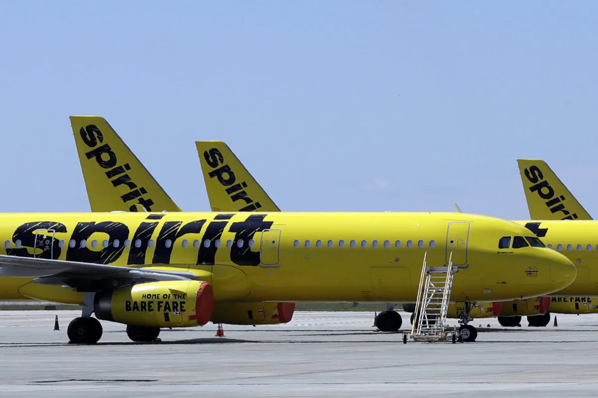 A line of Spirit Airlines jets sit on the tarmac at the Orlando International Airport in Orlando, Fla. on May 20, 2020. (Chris O'Meara/AP Photo)