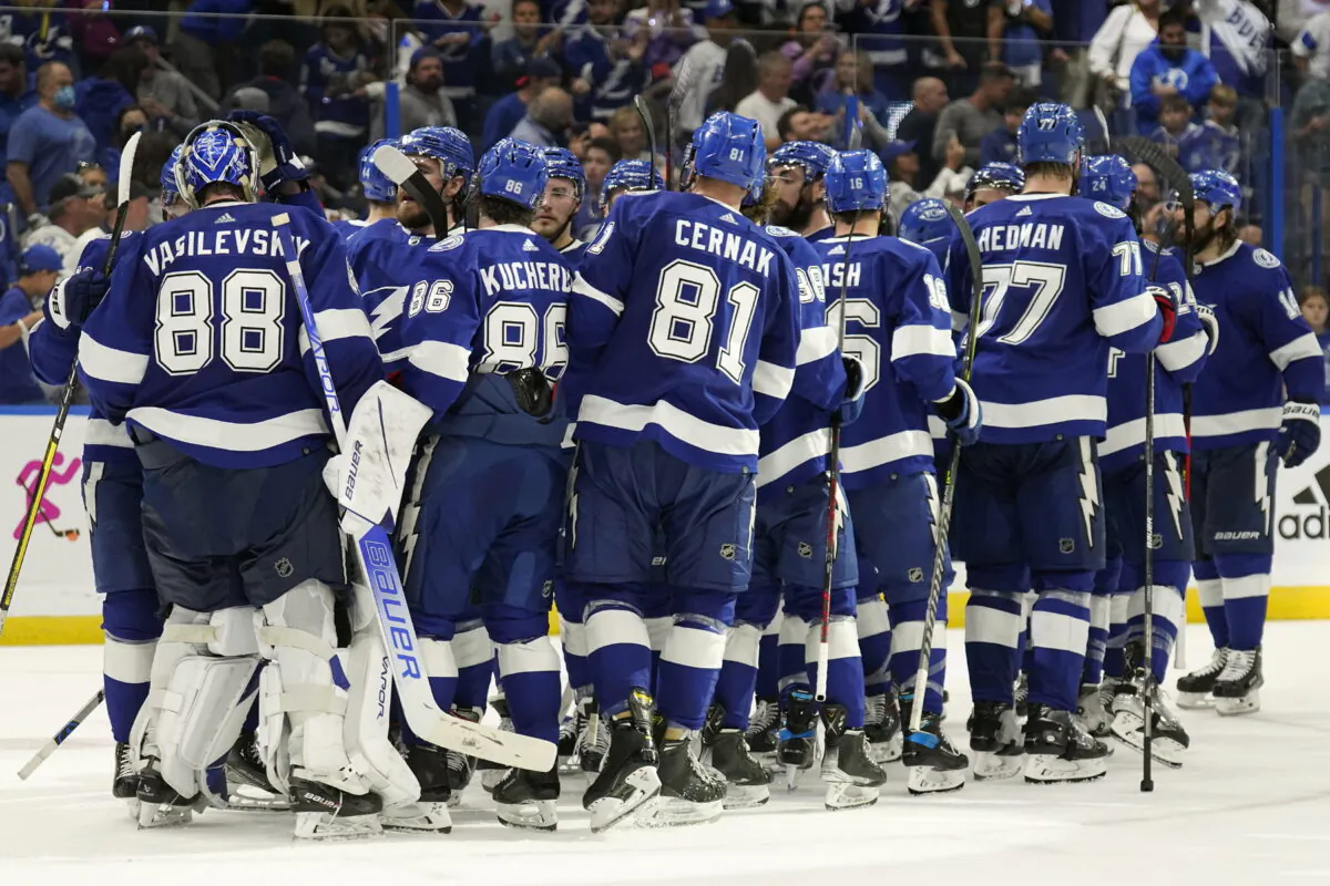 Tampa Bay Lightning goaltender Andrei Vasilevskiy (88) celebrates with his teammates after the team defeated the New York Rangers during Game 4 of the NHL hockey Stanley Cup playoffs Eastern Conference finals in Tampa, Fla., on June 7, 2022. (Chris O'Meara/AP Photo)