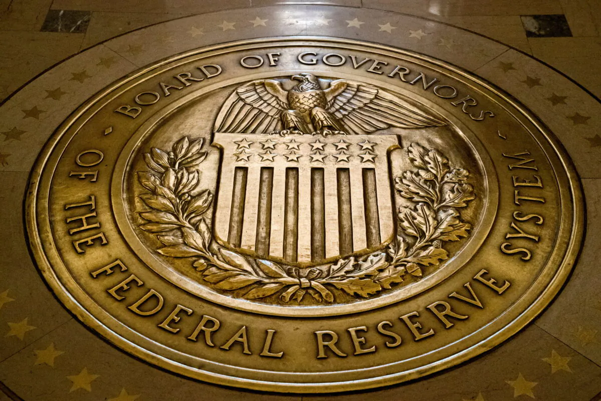 The seal of the Board of Governors of the United States Federal Reserve System is displayed on the ground at the Marriner S. Eccles Federal Reserve Board Building in Washington on Feb. 5, 2018. (Andrew Harnik/AP Photo)