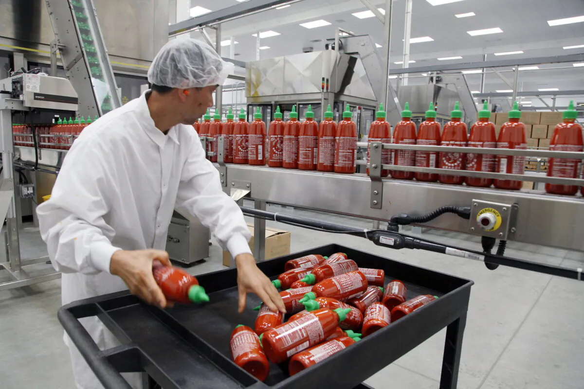 Sriracha chili sauce is produced at the Huy Fong Foods factory in Irwindale, Calif., on Oct. 29, 2013. (Nick Ut/AP Photo)