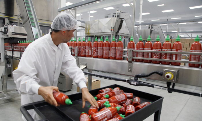 Sriracha chili sauce is produced at the Huy Fong Foods factory in Irwindale, Calif., on Oct. 29, 2013. (Nick Ut/AP Photo)