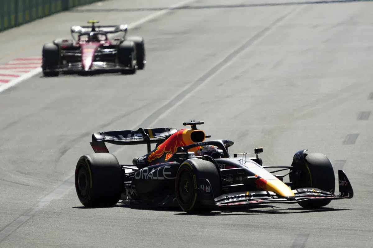Red Bull driver Max Verstappen of the Netherlands leads Ferrari driver Carlos Sainz of Spain during the Azerbaijan Formula One Grand Prix at the Baku circuit, in Baku, Azerbaijan, on June 12, 2022. (AP Photo/Sergei Grits)