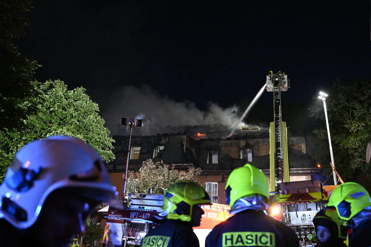 Fire fighters battle a fire at the Alzheimer center in Roztoky, near Prague, on June 1, 2022. (Michal Kamaryt/CTK/via AP)