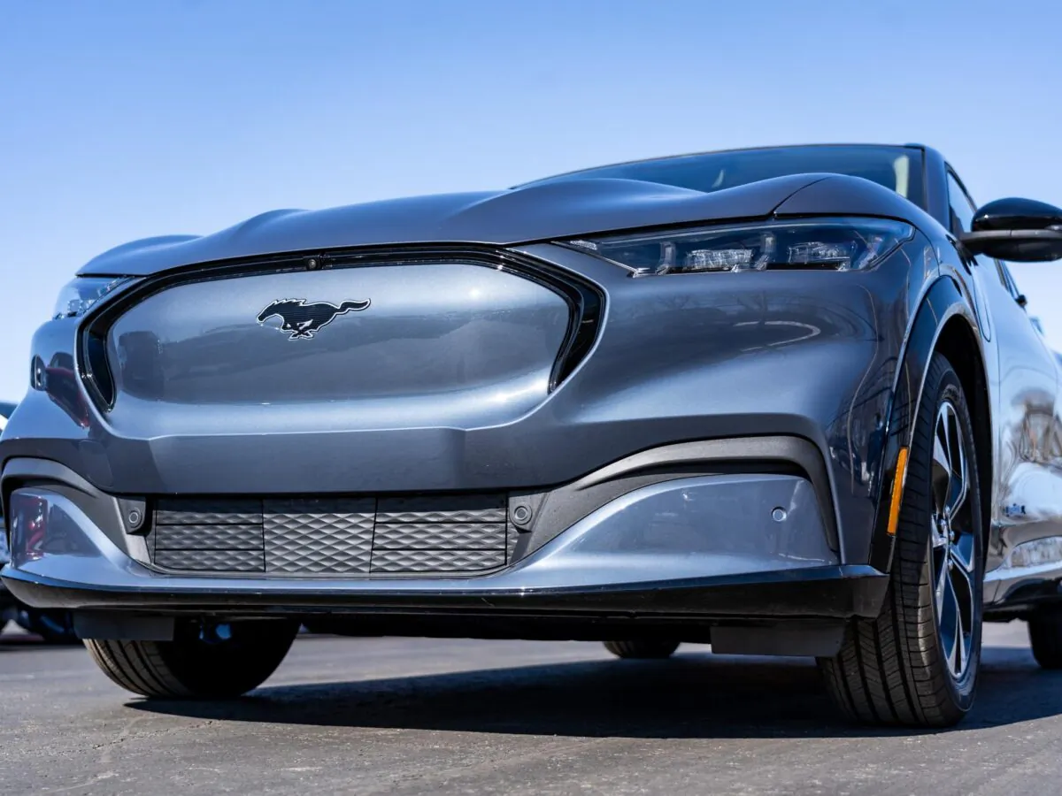 Ford’s Mustang Mach-E, an all-electric SUV, already faces supply chain concerns, compliance costs, and price competition. Its planned three-row successor has been cancelled. (Nick Shoe/Shutterstock)