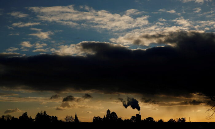 Smoke rises above a factory at sunset in Rugby, Britain, on Feb. 10, 2021. (Matthew Childs/    TPX Images of the Day via Reuters)