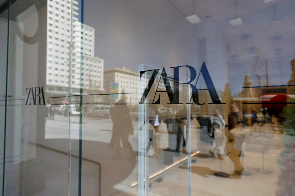 Zara's logo is displayed on a window, at one of the company's largest stores in the world, in Madrid, on April 7, 2022. (Juan Medina/Reuters)