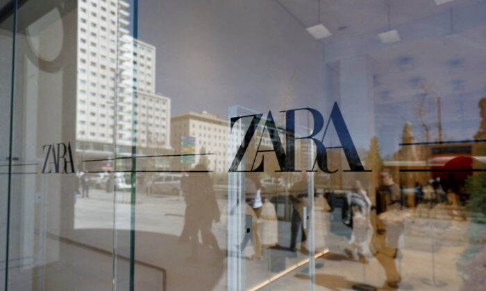 Zara's logo is displayed on a window, at one of the company's largest stores in the world, in Madrid, on April 7, 2022. (Juan Medina/Reuters)