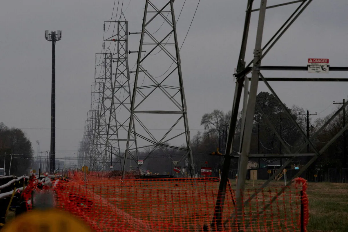 Overhead power lines during record-breaking temperatures in Houston, on Feb. 17, 2021. (Adrees Latif/Reuters)