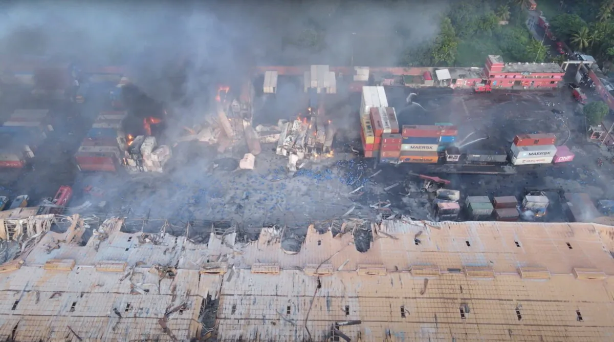Drone footage shows smoke rising from the spot after a massive fire broke out in an inland container depot at Sitakunda, near the port city Chittagong, Bangladesh, on June 5, 2022. (Al Mahmud BS/Handout via Reuters)
