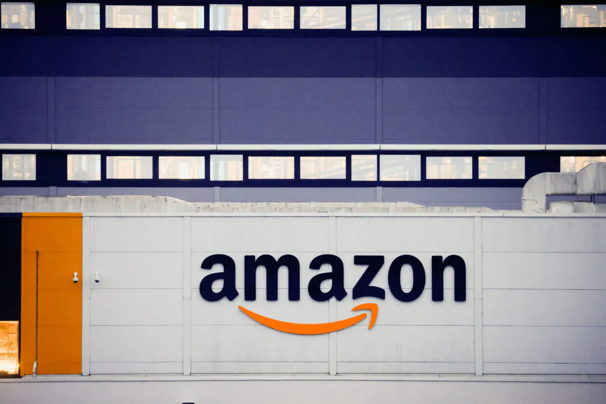 The logo of Amazon is seen at the company's logistics center in Bretigny-sur-Orge, near Paris, France, Dec. 7, 2021. (Gonzalo Fuentes/Files/Reuters)