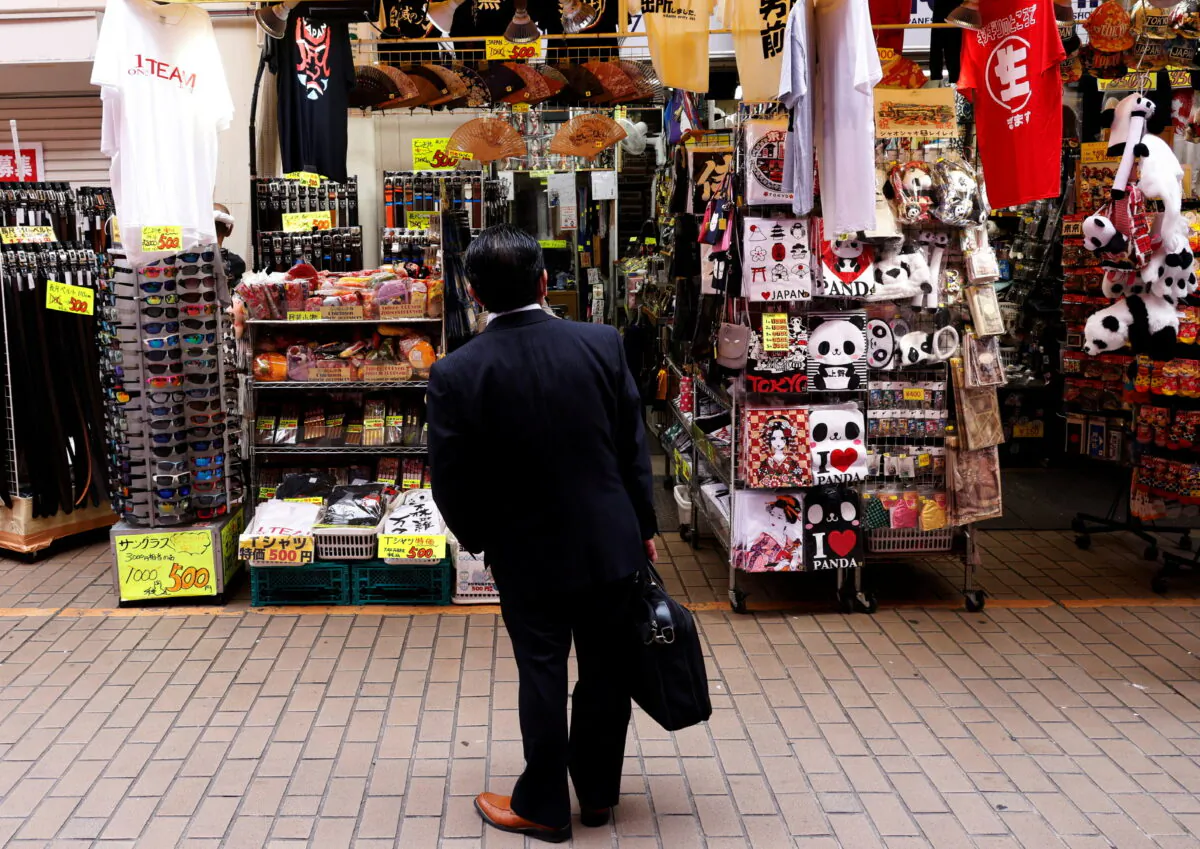 A man looks at a shop at the Ameyoko shopping district in Tokyo, Japan, on May 20, 2022. (Kim Kyung-Hoon/Reuters)