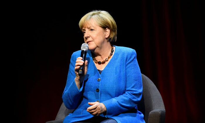 Former German Chancellor Angela Merkel speaks during a talk about "the challenging issues of our time" with author Alexander Osang (not pictured) at the Berliner Ensemble theatre in Berlin, Germany, on June 7, 2022. (Annegret Hilse/Reuters)