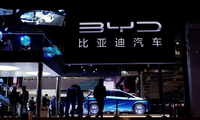 People visit the BYD booth during a media day for the Auto Shanghai show in Shanghai, China, on April 19, 2021. (Aly Song/Reuters)