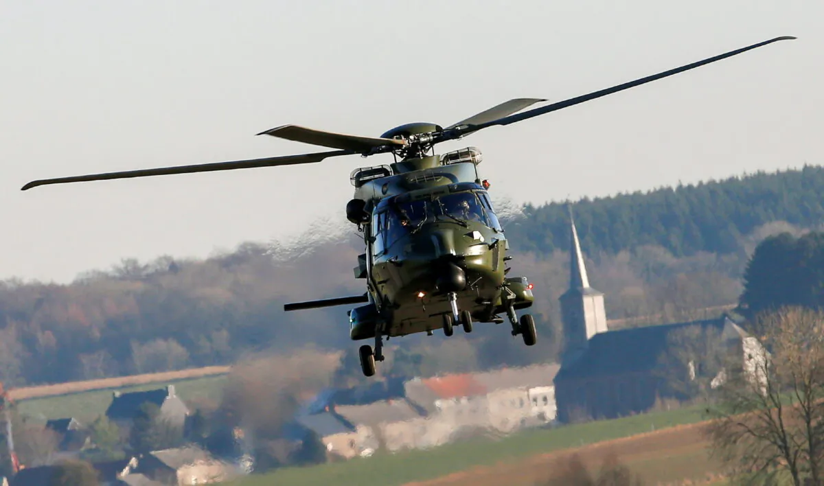 An NH90 helicopter during the Black Blade military exercise involving several European Union countries and organized by the European Defence Agency at the Florennes airbase in Belgium on Nov. 30, 2016. (Yves Herman/Reuters)