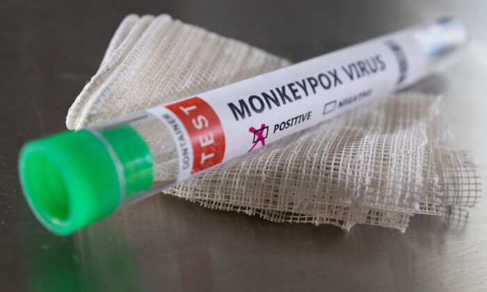 Test tube labelled "Monkeypox virus positive" in a photo illustration taken on May 22, 2022. (Dado Ruvic/Illustration/Reuters)