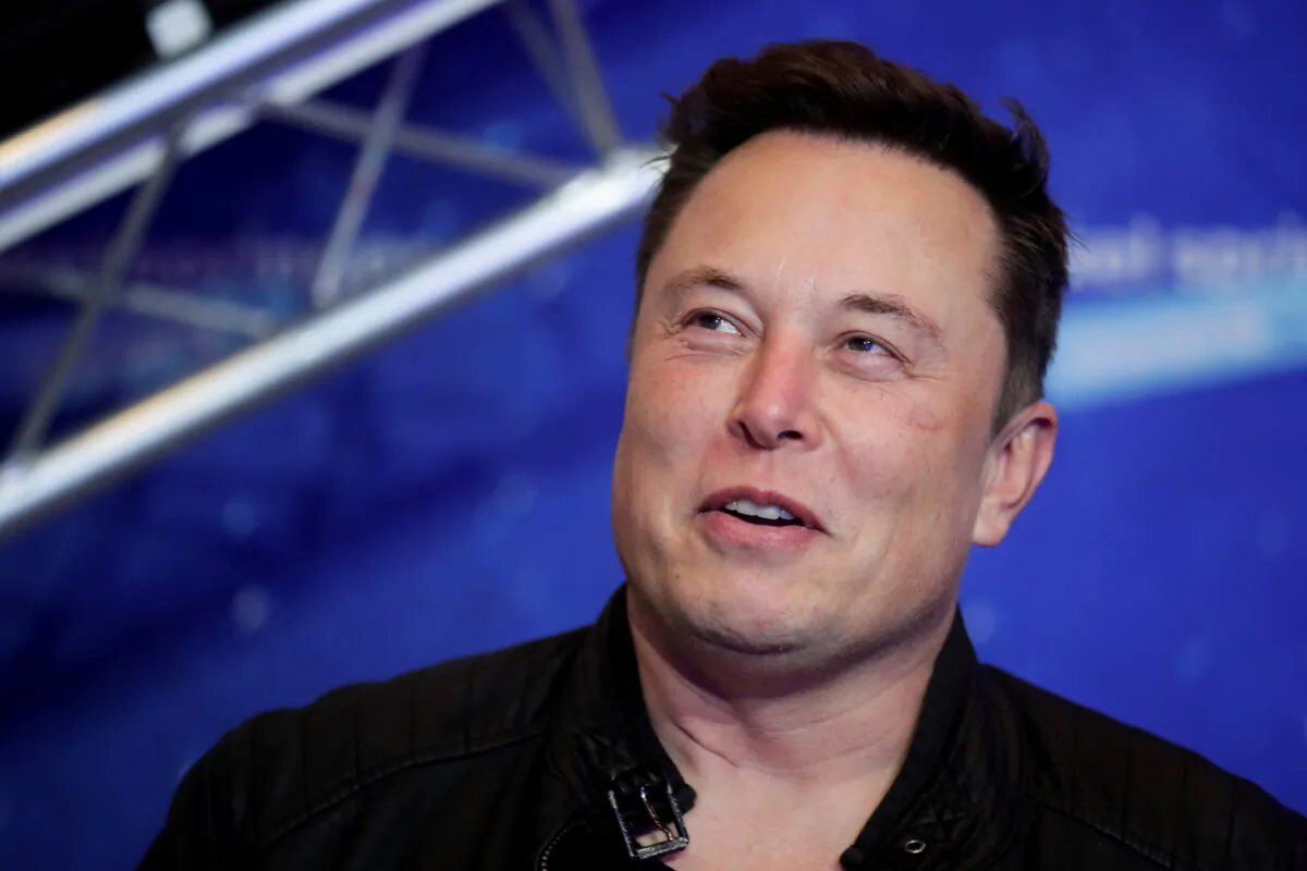SpaceX owner and Tesla CEO Elon Musk looks on after arriving on the red carpet for the Axel Springer award, in Berlin, Germany, on Dec. 1, 2020. (Hannibal Hanschke/Pool/File Photo/Reuters)