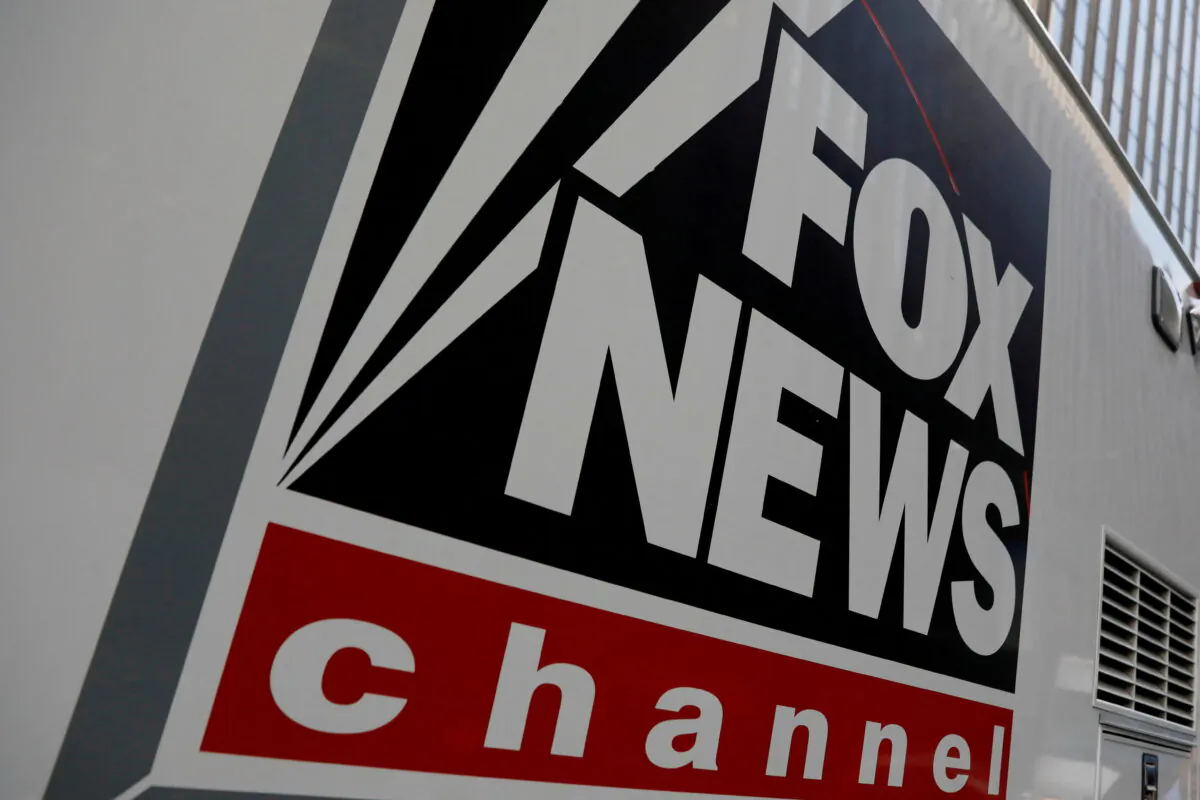 A Fox News channel sign is seen on a television vehicle outside the News Corporation building in New York City on Nov. 8, 2017. (Shannon Stapleton/Reuters)