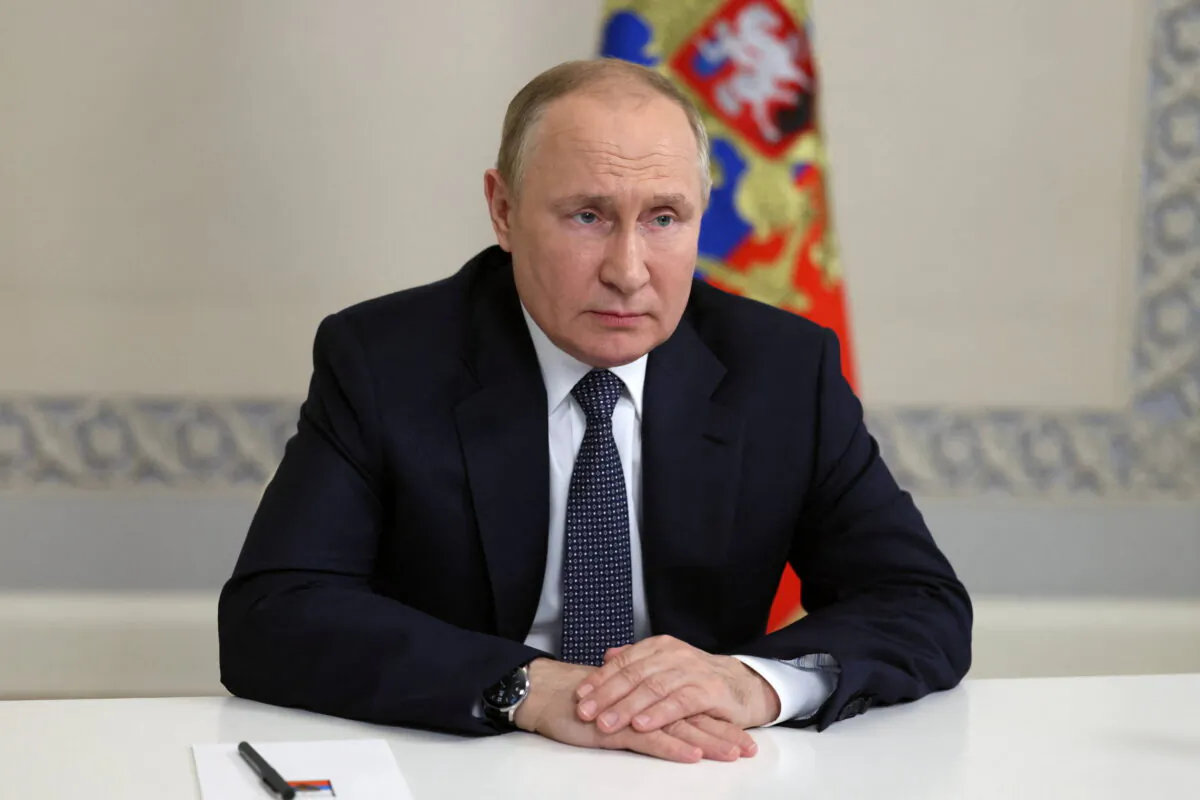 Russian President Vladimir Putin chairs a meeting with members of the Security Council via video link in Moscow on June 22, 2022. (Sputnik/Mikhail Metzel/Kremlin via Reuters)