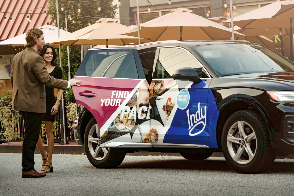A rideshare car with ads wrapped by mobile advertisement company Carvertise in Chicago in June 2022, in a file photo acquired by Reuters on June 22, 2022. (Carvertise/Handout via Reuters)
