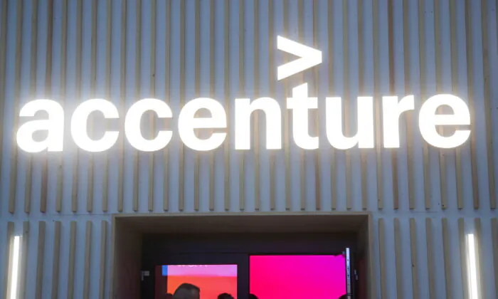 The logo of Irish services and consulting company Accenture is seen at a temporary office during the World Economic Forum summit in the Alpine resort of Davos, Switzerland, on May 25, 2022. (Arnd Wiegmann/Reuters)