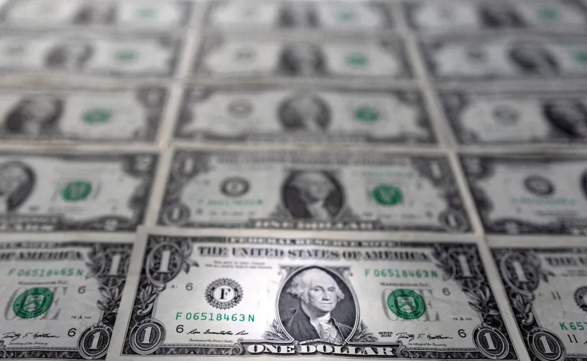 U.S. dollar banknotes are displayed in this illustration taken on Feb 14, 2022. (Dado Ruvic/Reuters)