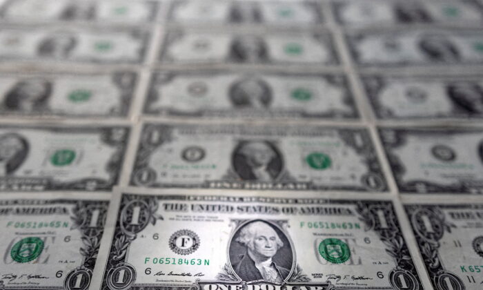 U.S. dollar banknotes are displayed in this illustration taken on Feb 14, 2022. (Dado Ruvic/Reuters)