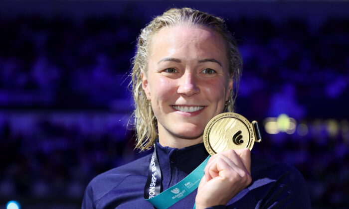 Gold medalist Sarah Sjoström poses after winning the Women's 50m Butterfly Final at the 19th FINA World Swimming Championships in Budapest, Hungary on June 24, 2022.  (Antonio Bronic / Reuters)