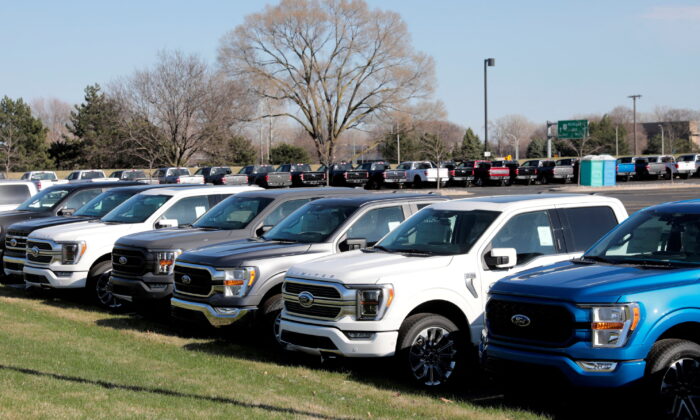 Newly manufactured Ford Motor Co. 2021 F-150 pick-up trucks waiting for missing parts in Dearborn, Mich. on March 29, 2021. (Rebecca Cook/Reuters)