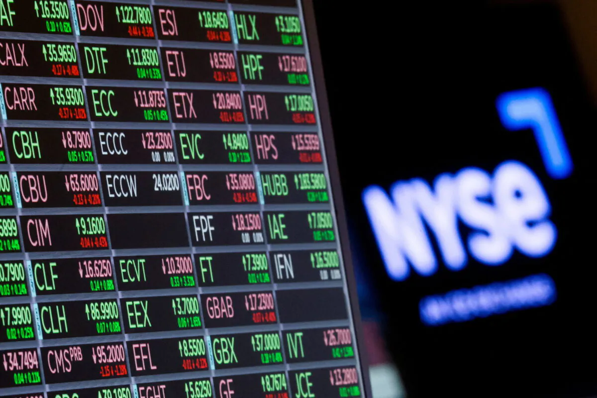 A screen displays trading information for stocks on the floor of the New York Stock Exchange (NYSE) in New York City on June 27, 2022. (Brendan McDermid/Reuters)
