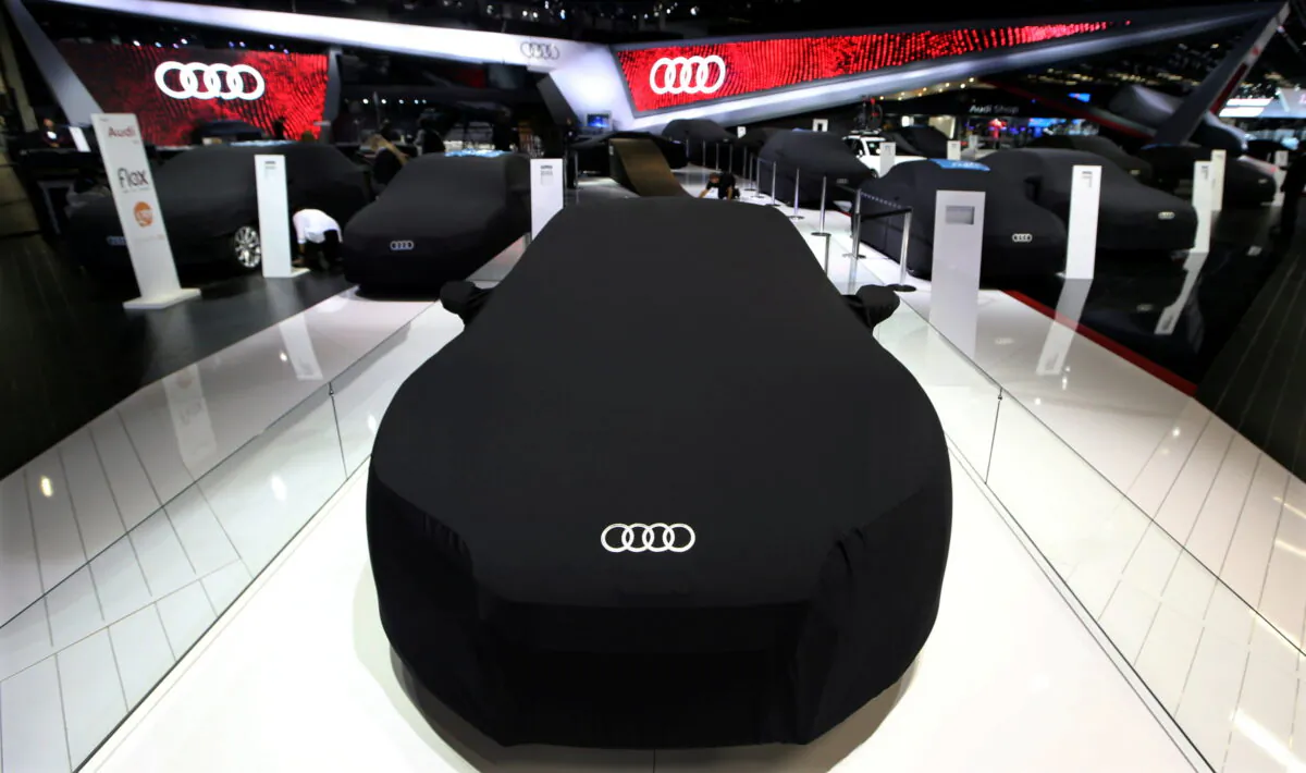 Covered Audi cars are seen during the Sao Paulo International Motor Show in Sao Paulo, on Nov. 8, 2016. (Paulo Whitaker/Reuters)