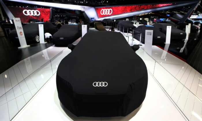 Covered Audi cars are seen during the Sao Paulo International Motor Show in Sao Paulo, on Nov. 8, 2016. (Paulo Whitaker/Reuters)