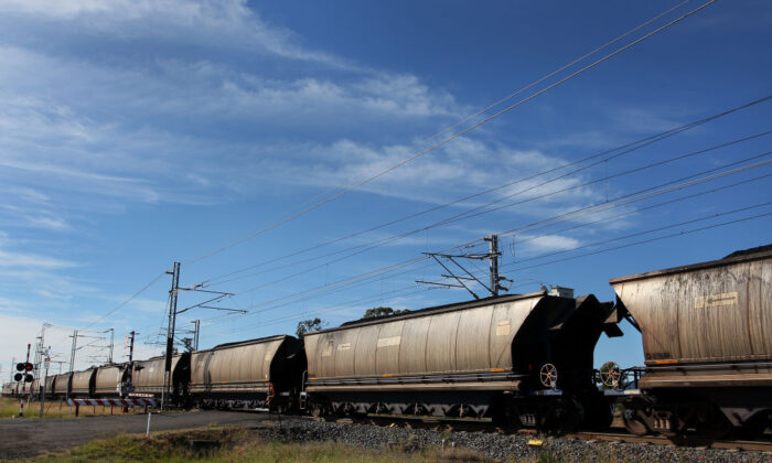 A coal train is seen moving parallel to the A4 Highway in the Clermont and Blackwater region in Queensland, Australia, on April 29, 2019. (Lisa Maree Williams/Getty Images)